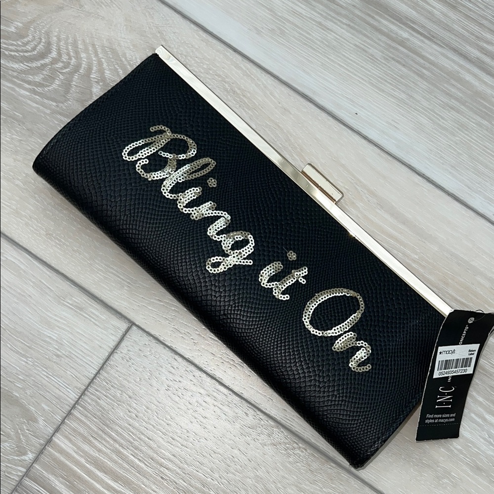 Charming Charlie Black and Silver Clutch
